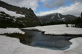 Melting snow gives way to river